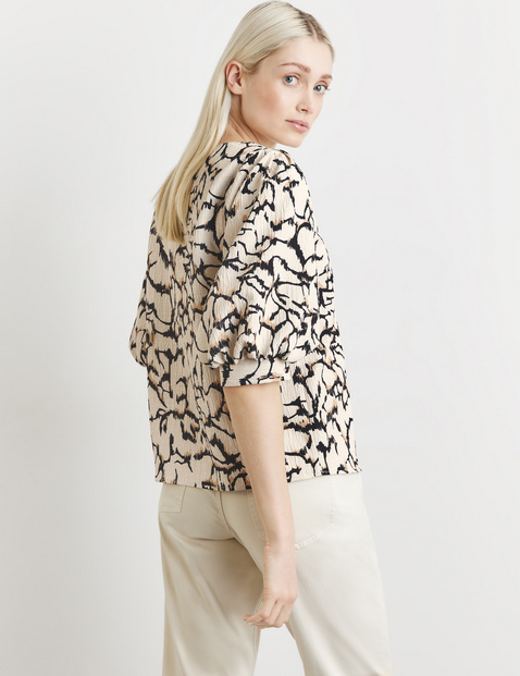 Bluse mit Puffärmeln