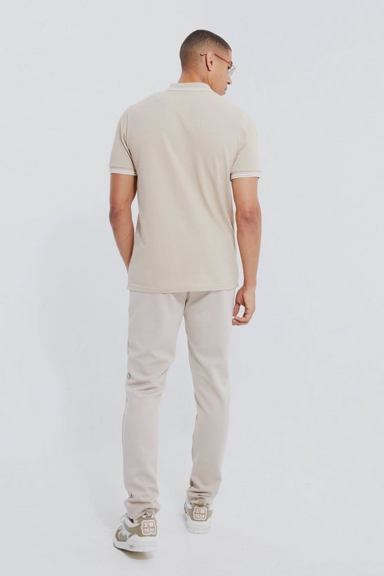 Pique Poloshirt mit Kronen-Stickerei