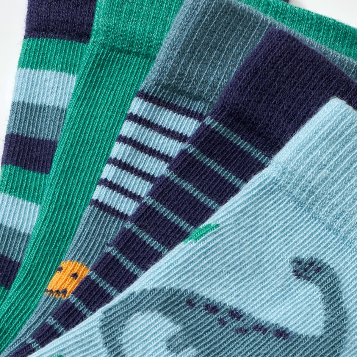 Socken mit Ringeln & Dino-Motiven, blau + grün, Gr. 27/31, 5 St