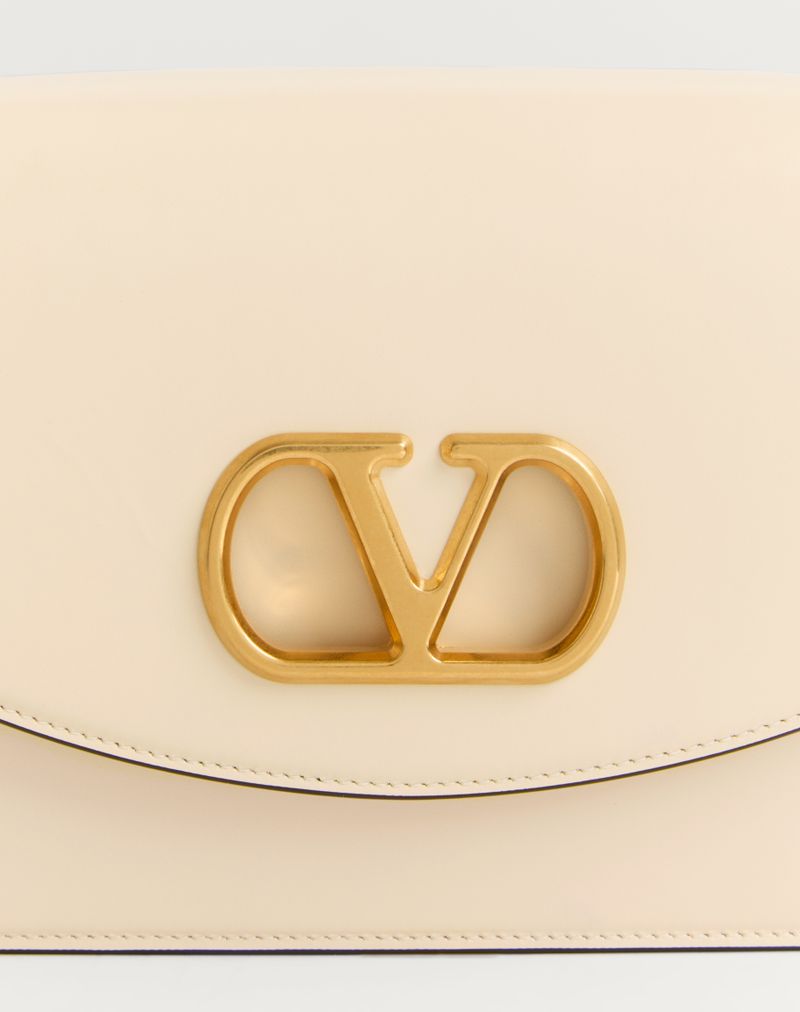 Bolsa de ombro Valentino Garavani Vain em couro de bezerro brilhante