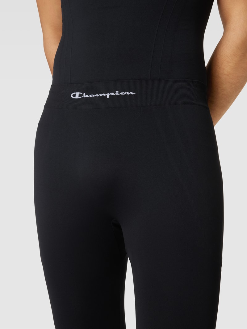 Leggings mit Label-Print in schwarz