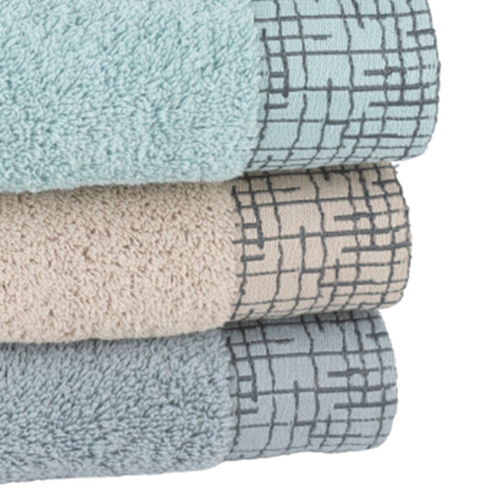 Serviette éponge liteau jacquard quadrillé