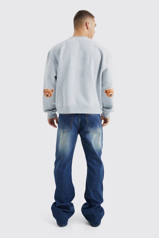 Kastiges Oversize Sweatshirt mit luxuriöser Applikation