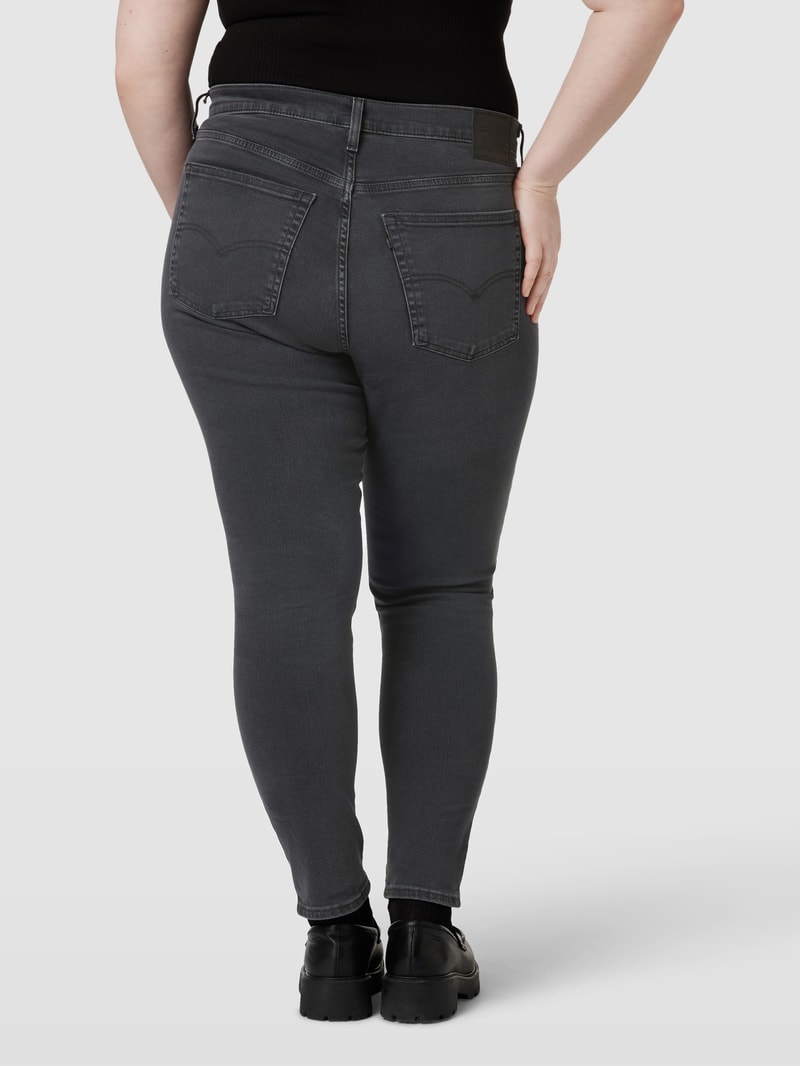 PLUS SIZE Skinny Fit Jeans mit Label-Patch in schwarz