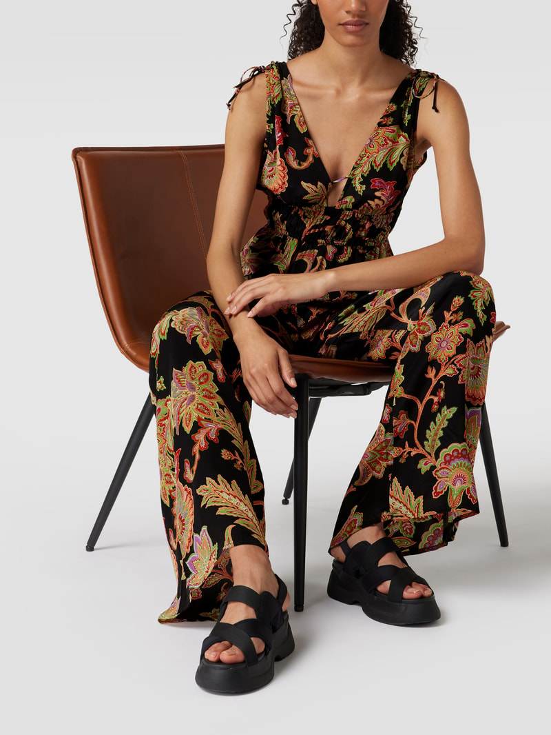 Jumpsuit mit floralem Allover-Muster in schwarz