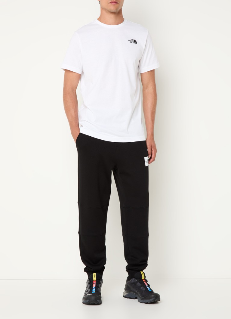Tricou The North Face cu logo și imprimeu pe spate.