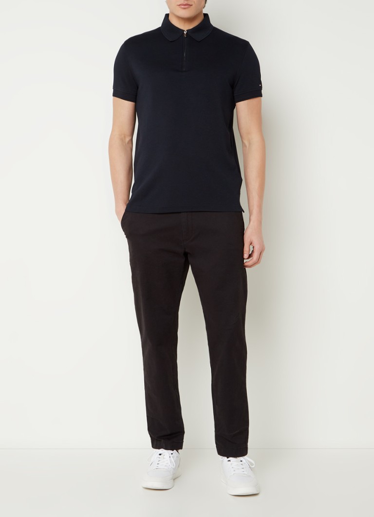 Polo Tommy Hilfiger de corte regular com meio zíper e logotipo.