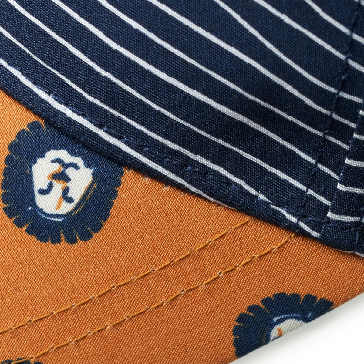 Basecap mit Löwen-Muster, blau & orange, Gr. 52/53, 1 St
