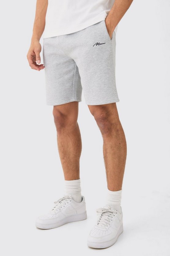 Lockere, mittellange Man Signature Shorts