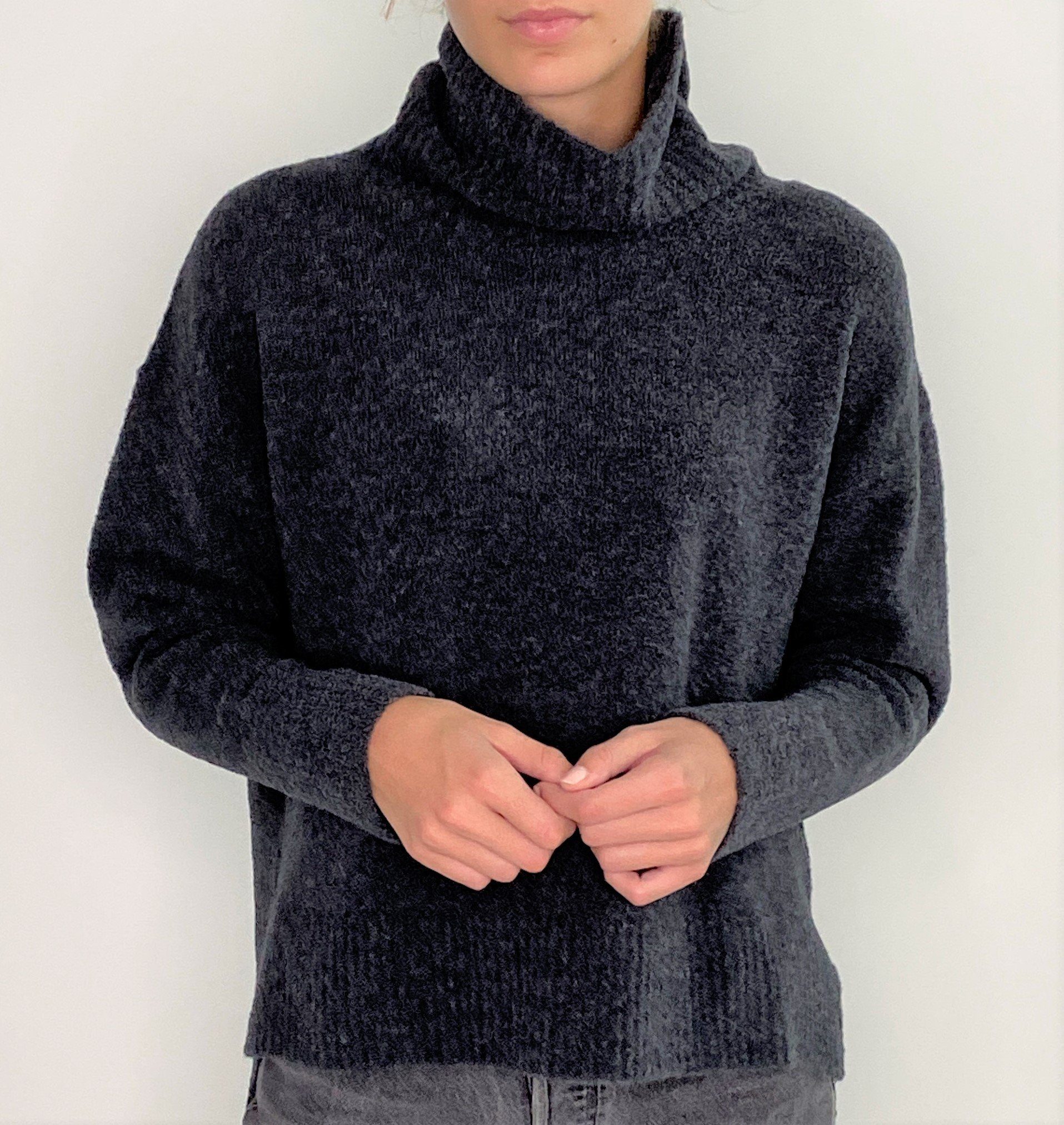 Zuckerwatte Rollkragenpullover in melierter Optik mit hohem Schurwolle Anteil