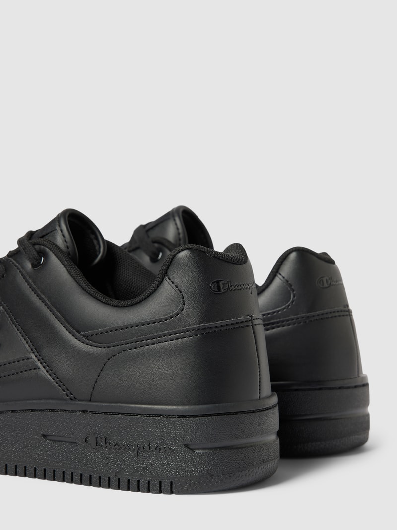 Sneaker mit Label-Detail in gelb