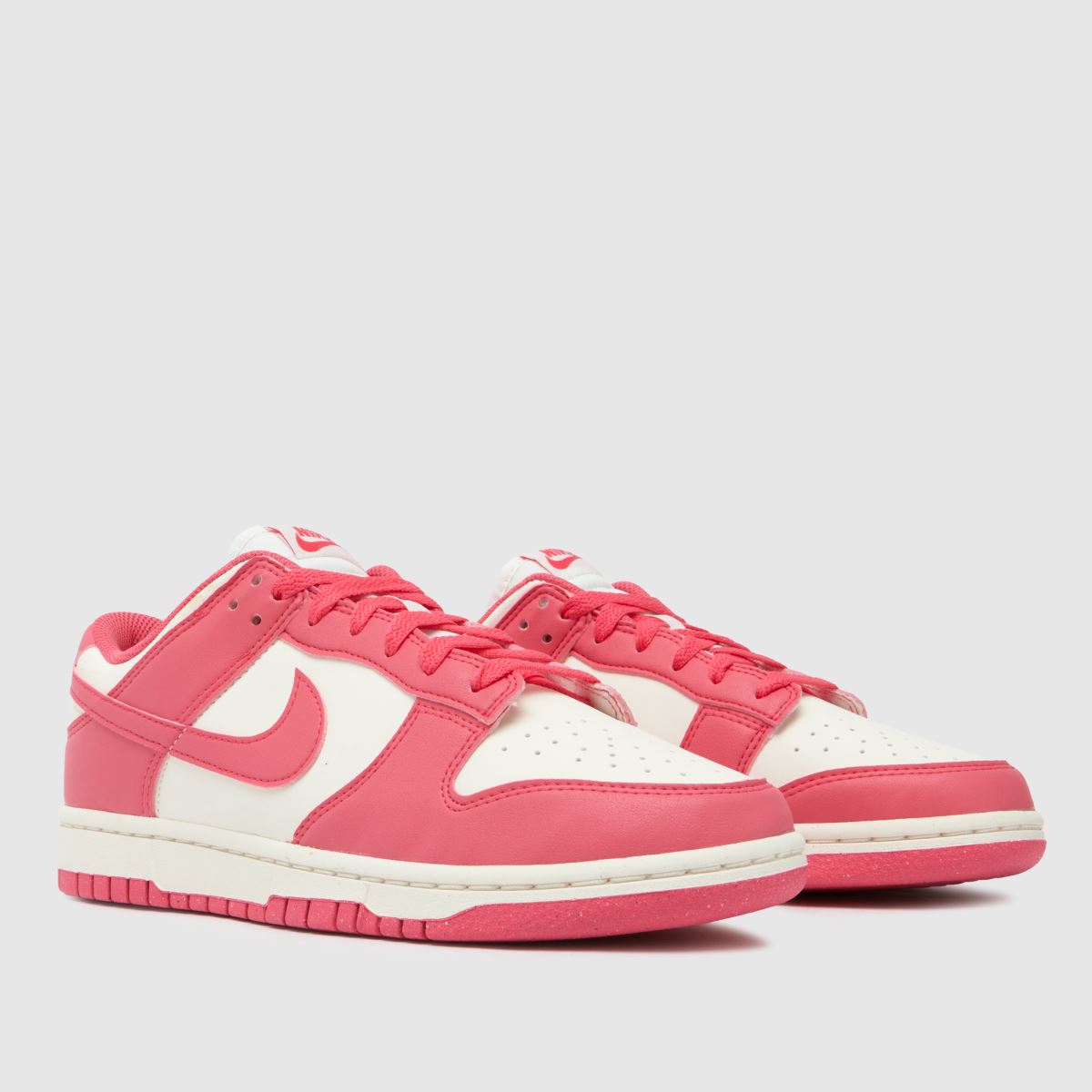 Nike Dunk Low-sneakers i vitt och rosa