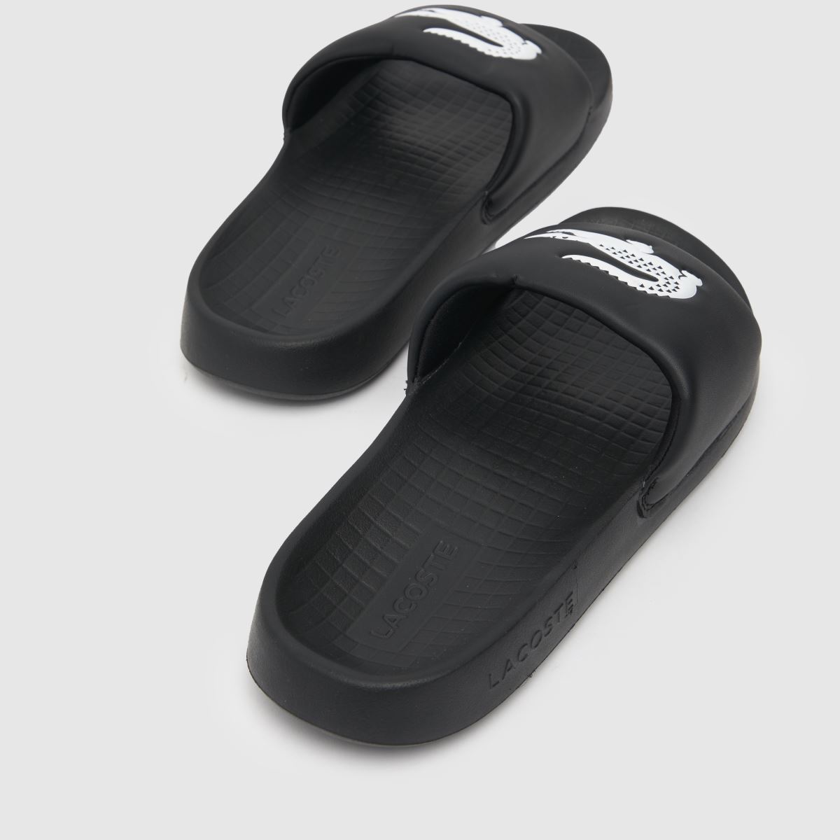 Lacoste – Serve 1.0 – Svarta och vita sandaler
