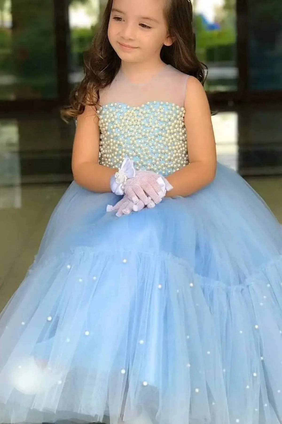 Riccotarz  Blaues Abendkleid für Mädchen mit transparentem Kragen und Perlendetail