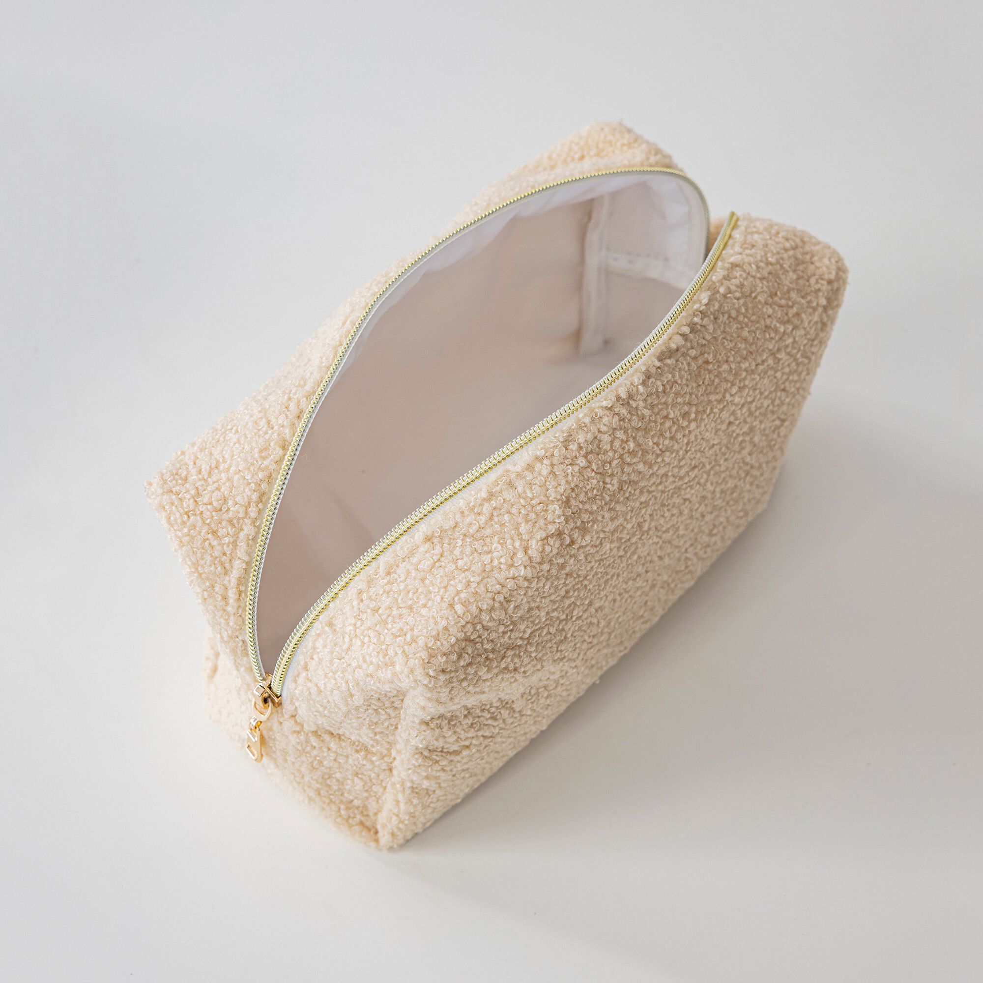 Trousse de toilette en bouclette sherpa