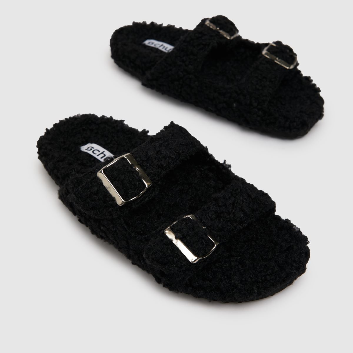 Schuh Haven – Svarta tofflor med borgspänne