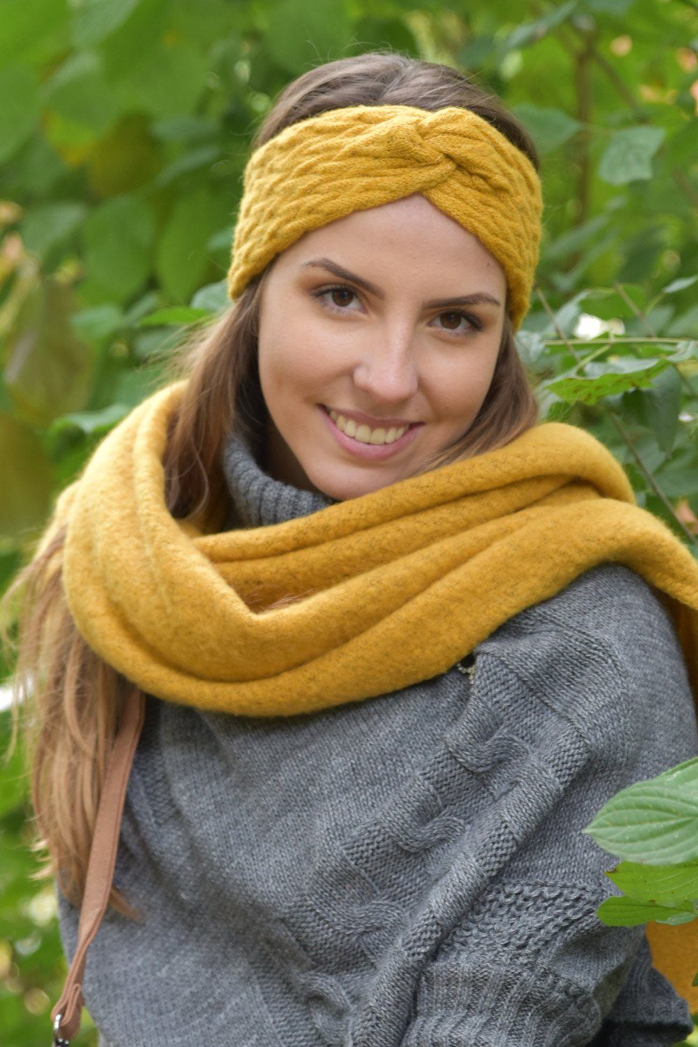 styleBREAKER Stirnband (1-St) Strick Stirnband mit Zopfmuster und Twist Knoten