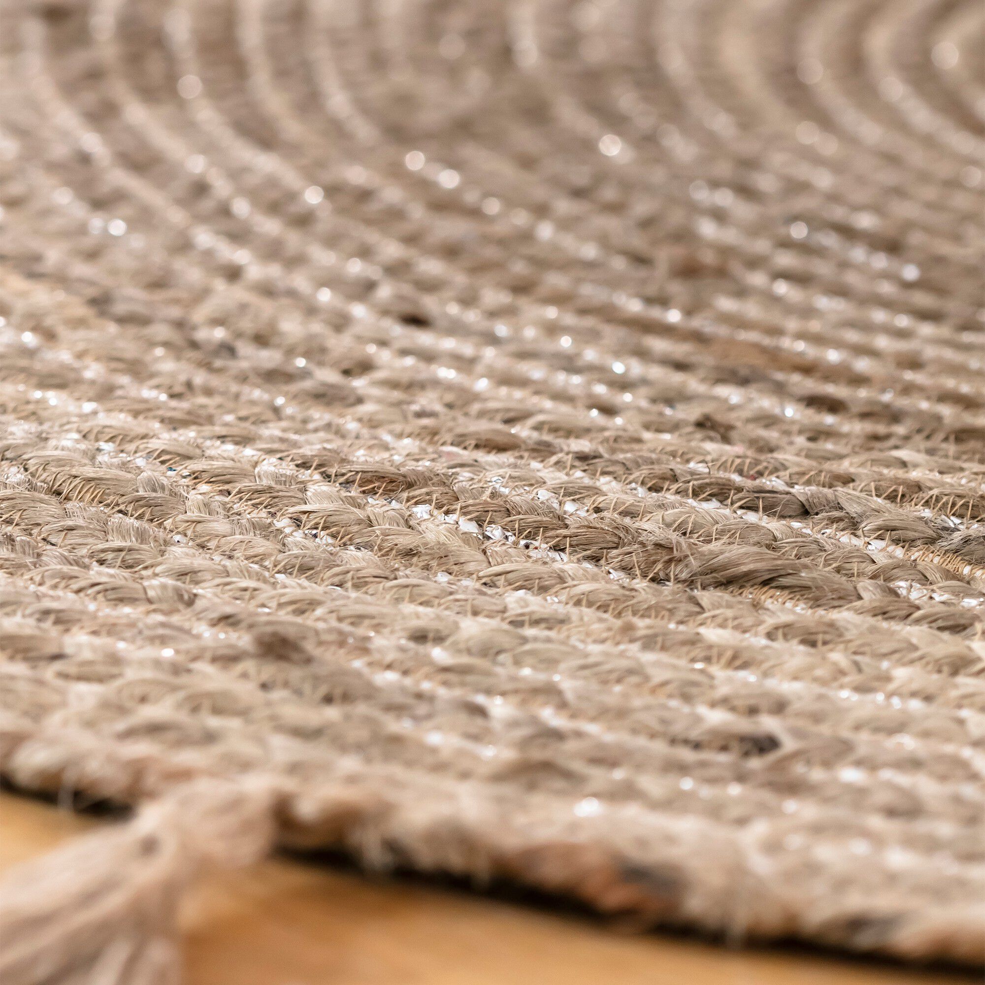Tapis rond en jute avec fil scintillant et pompons