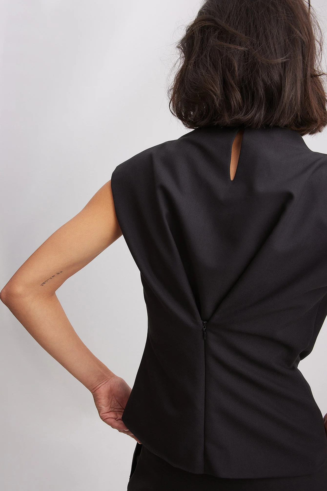 Rohes gewelltes Top