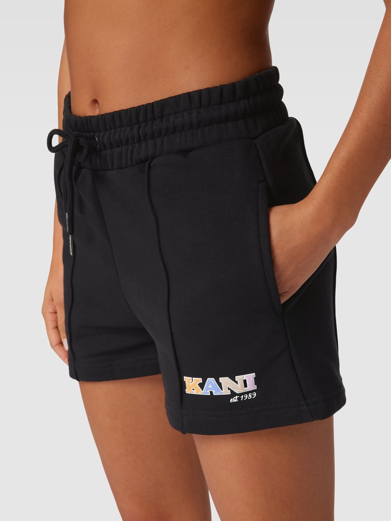 Sweatshorts mit Label-Patch Modell 'RETRO' in schwarz