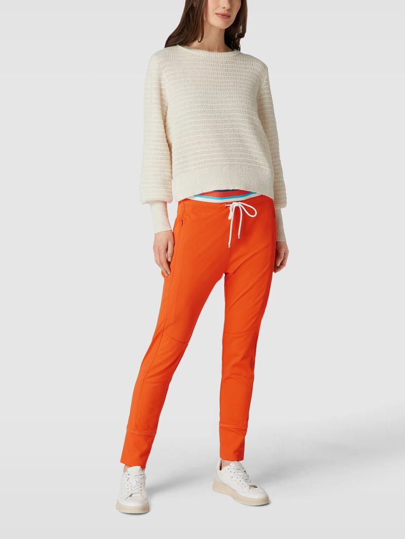 Sweatpants mit Teilungsnähten Modell 'FUTURE 4.0' in orange