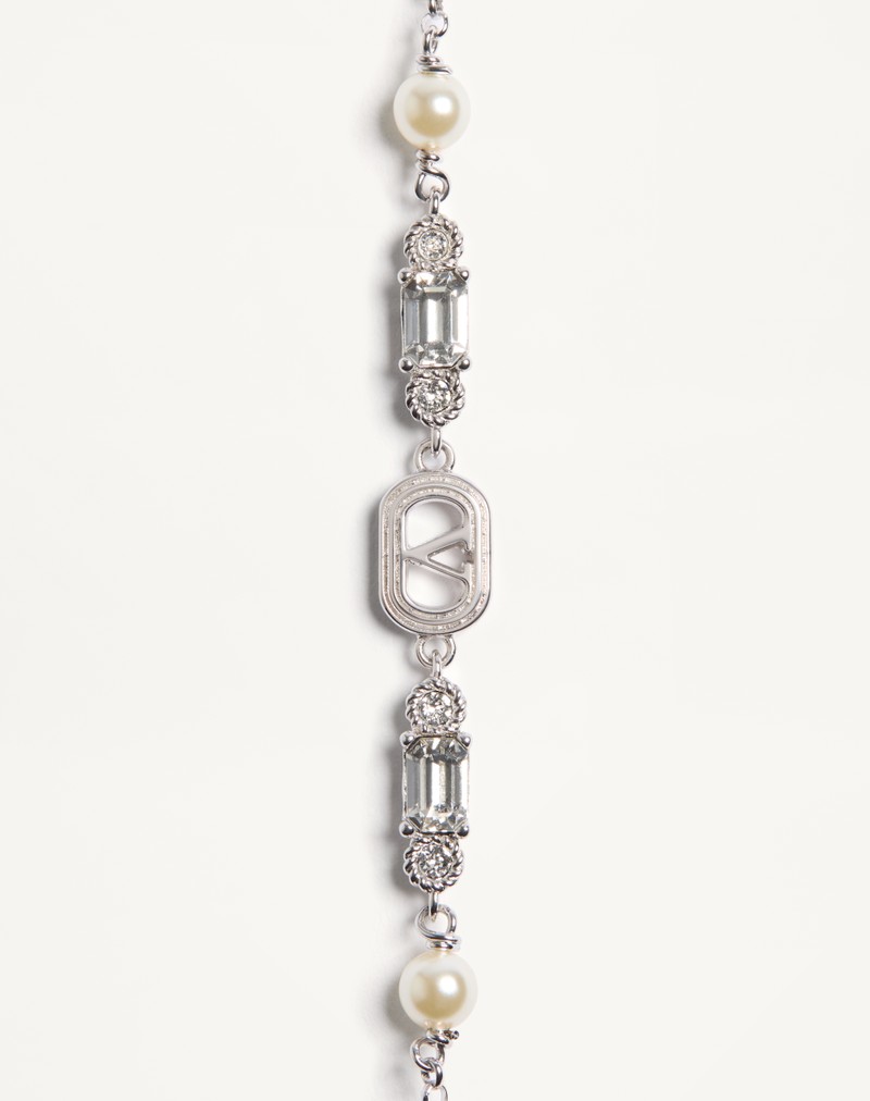 Ovalet armbånd i metal, perler og Swarovski® krystaller