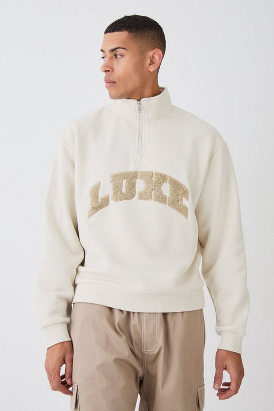 Kastiges Oversize Sweatshirt mit 1/4 Reißverschluss und Borg-Applikation