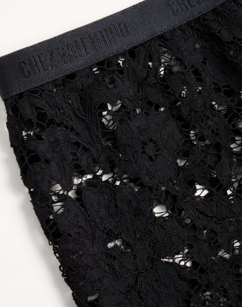 Leggings de renda com penas