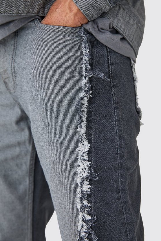 Lockere gespleißte Jeans mit ausgefranstem Saum