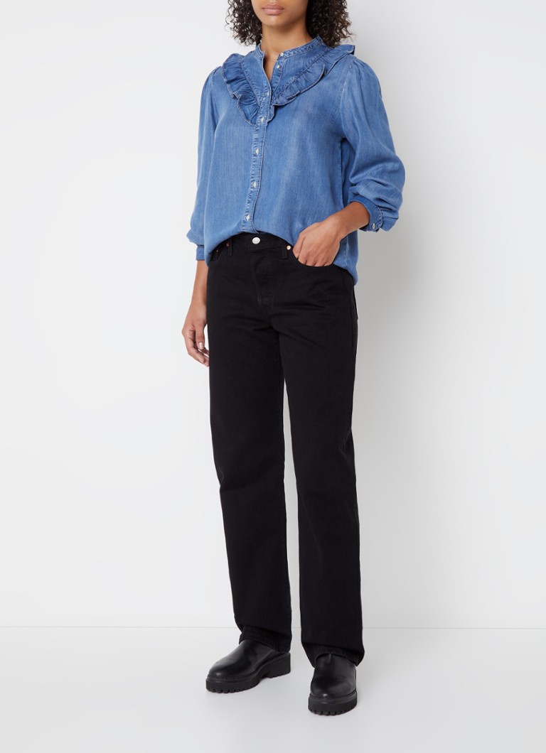 Blugi Levi's 501 din anii '90, talie medie, croială dreaptă, culoare decolorată.