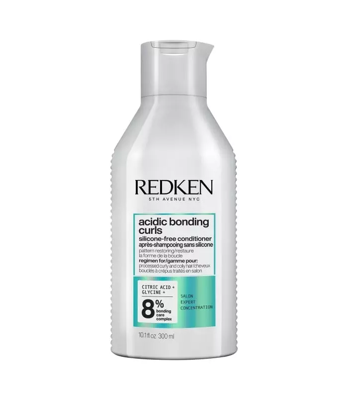 ACIDIC BONDING CURLS Après-shampoing réparateur pour cheveux bouclés abimés