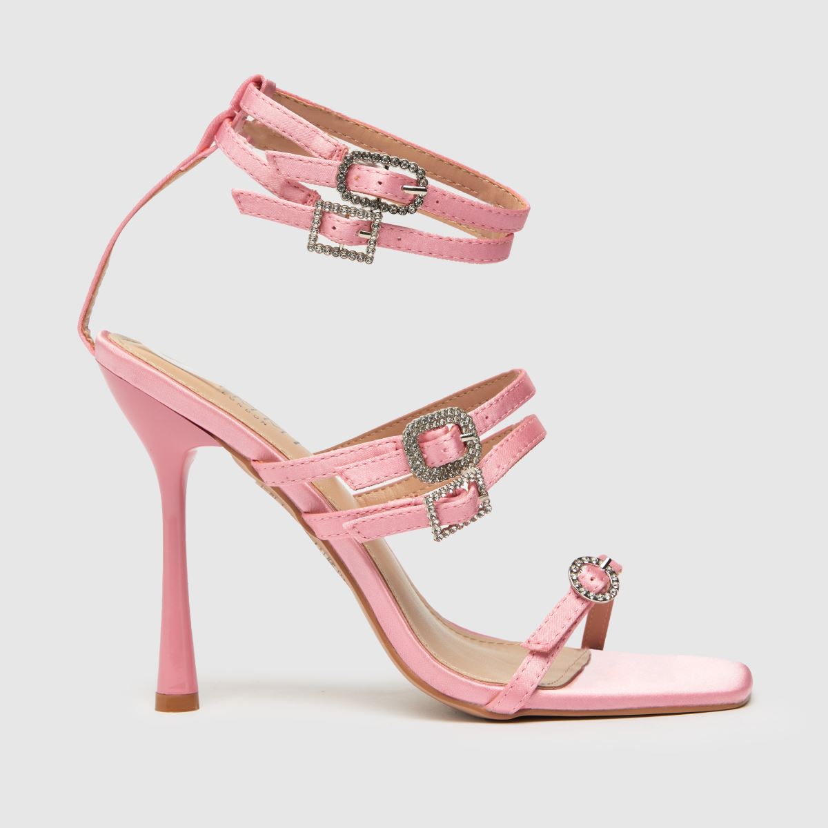 SIMMI – Rosa stiletto-höga klackar med remmar på stranden