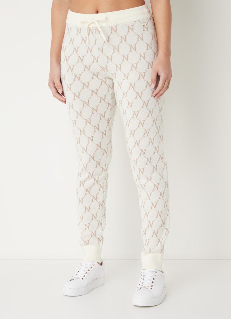 Pantaloni NIKKIE Brisbane slim fit, cu talie medie și imprimeu tricotat cu logo.