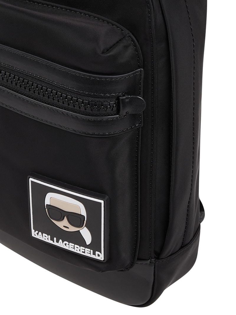 Umhängetasche mit Leder-Anteil in schwarz