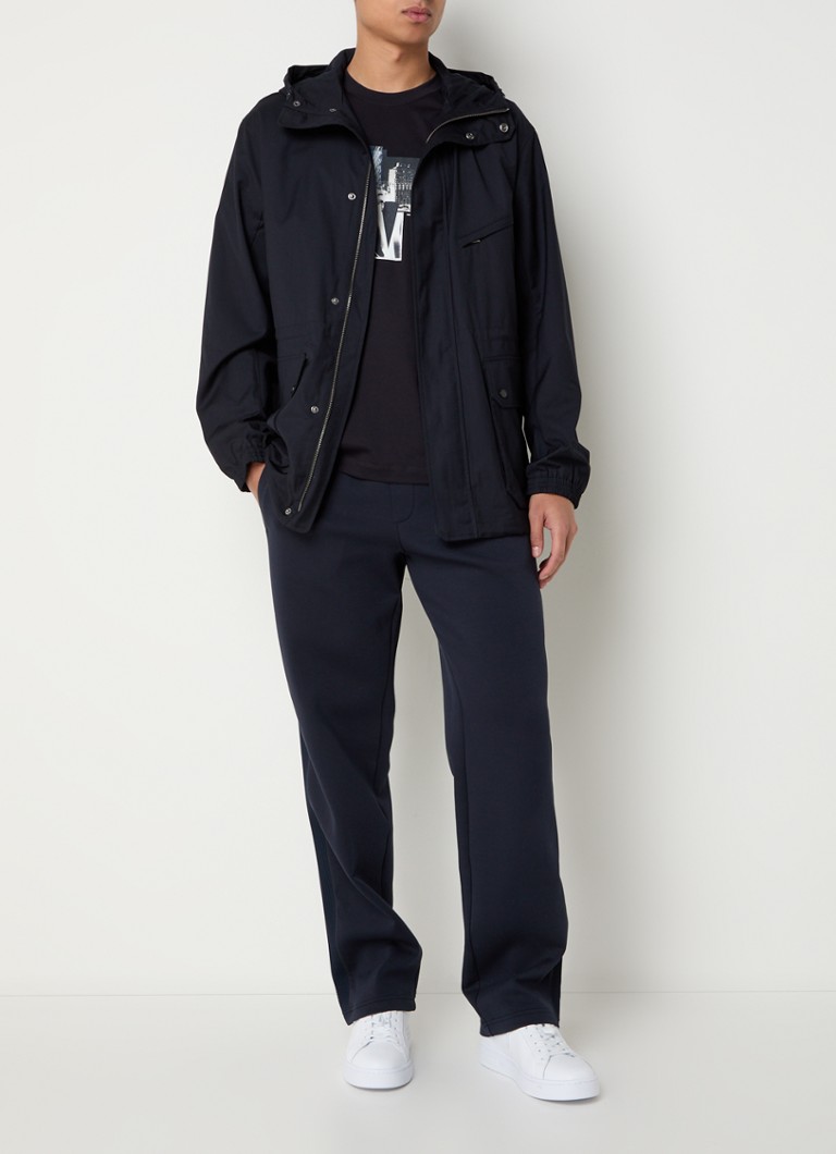 Parka Armani Exchange con cappuccio e tasche con patta.