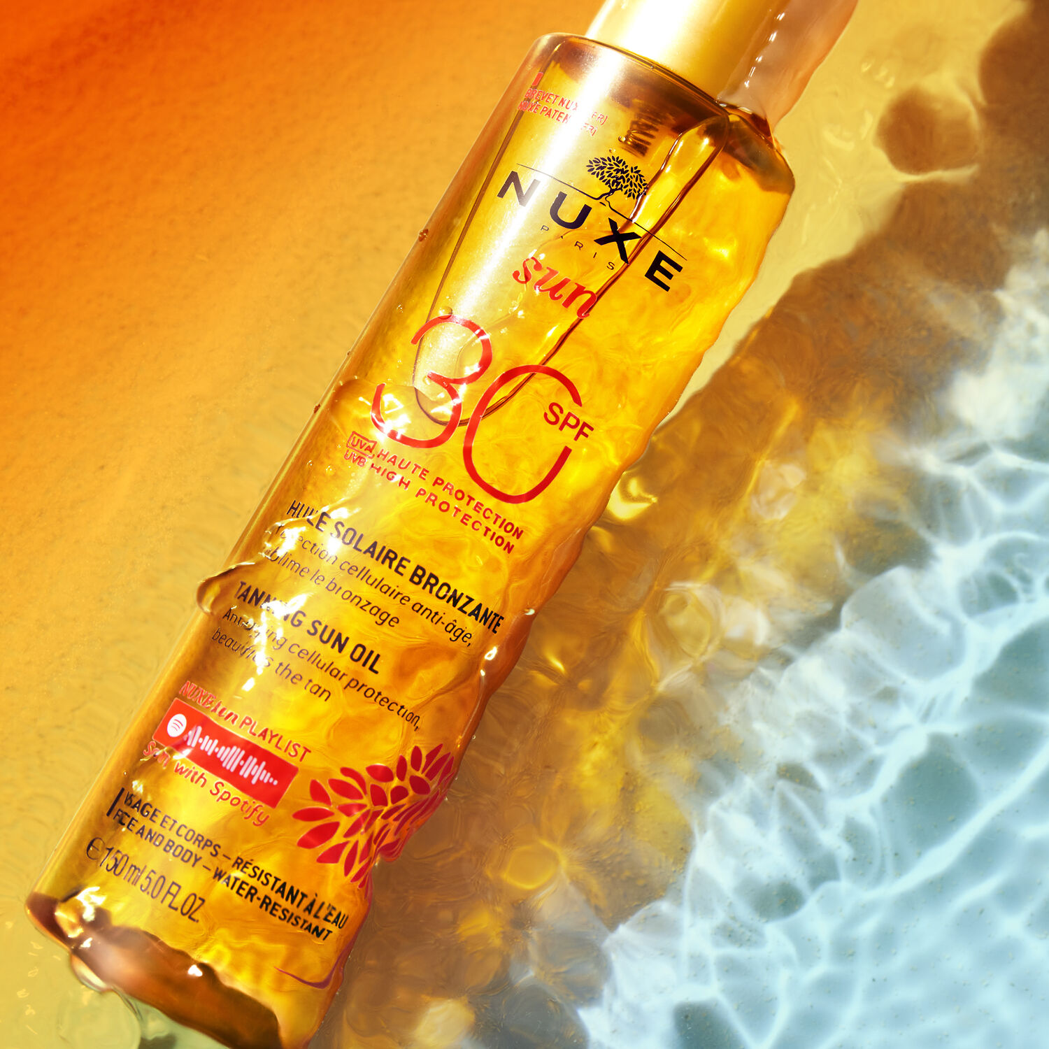 Nuxe Huile solaire bronzante haute protection SPF30 Nuxe Sun - Tous types de peaux - 150ml